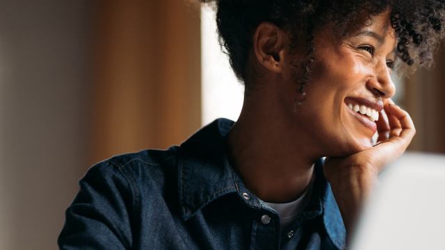 Life sciences professional smiling during a conversation
